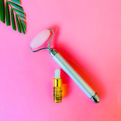 Natural Vibes: Rose Quartz Vibrating Roller with FREE Gold Beauty Elixir Oil for Face, Neck and Under eye [CLONE]