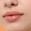 Makeup Revolution: Relove Roll Baby Lip Oil Papaya